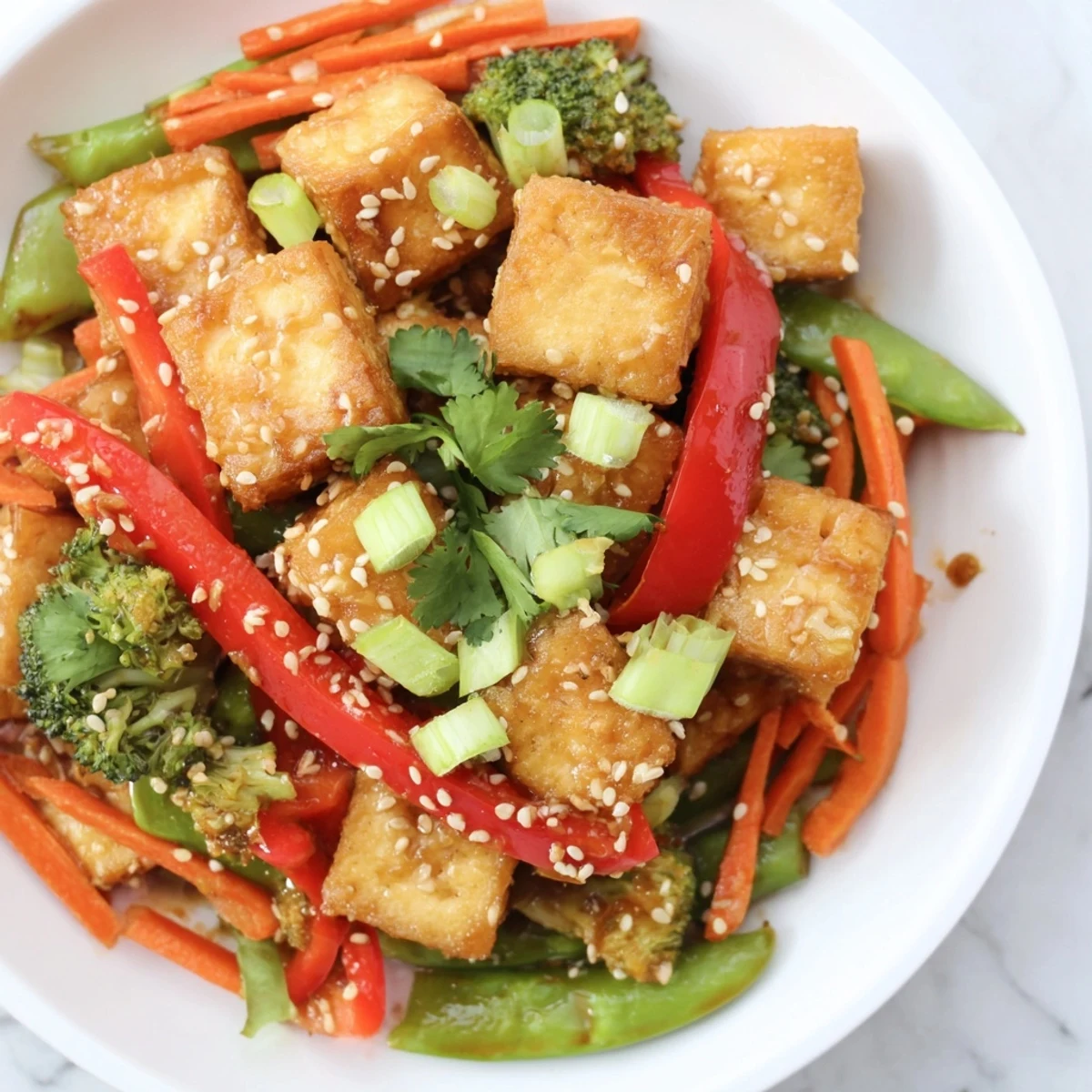 Aromatic Sesame Ginger Tofu Stir-Fry showcasing perfectly browned tofu and tender vegetables, ready to eat.