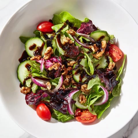 Quick Balsamic Vinegar Salad tossed with glossy dressing, offering a refreshing and tangy taste.